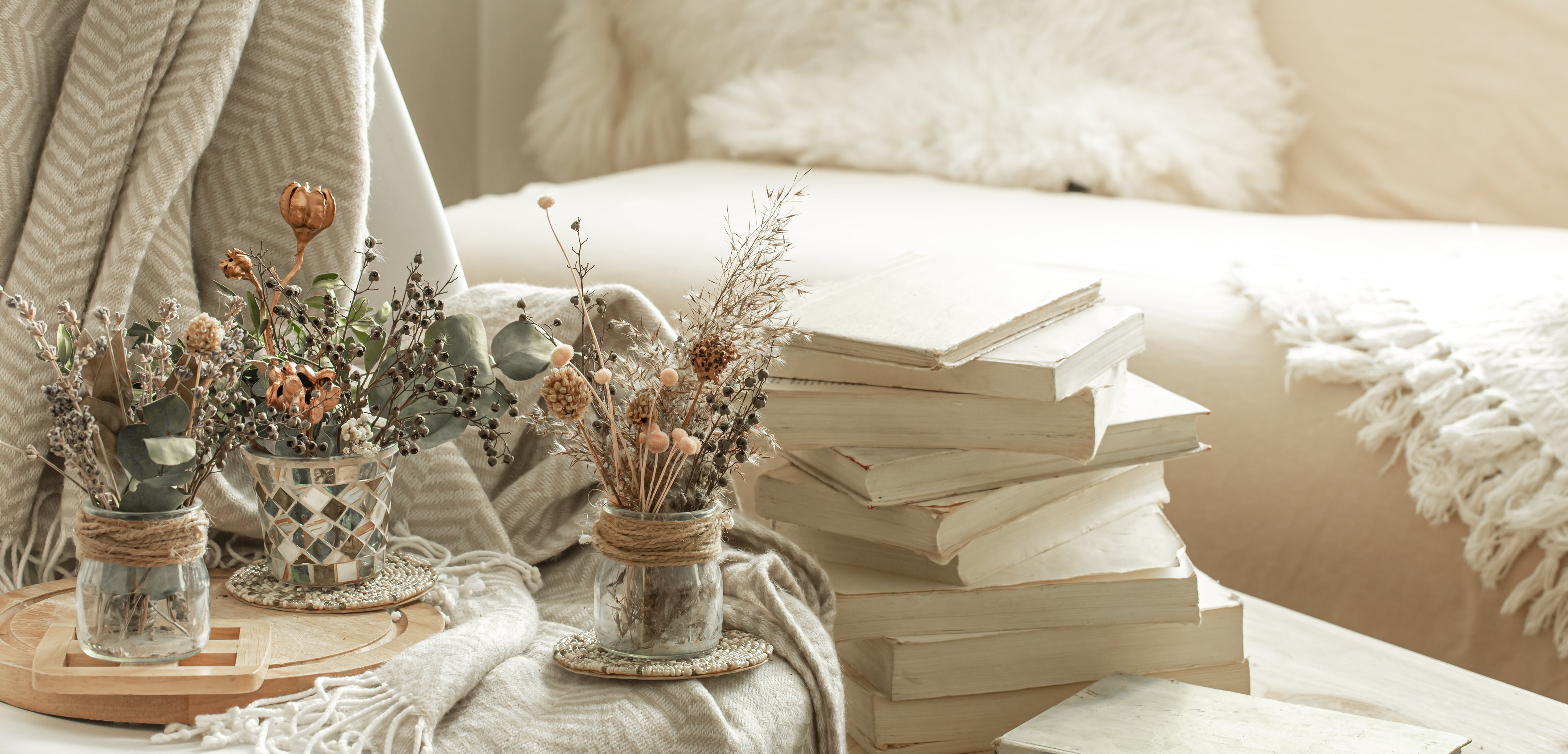 home-cozy-interior-room-with-books-dried-flowers-vase_1.jpg