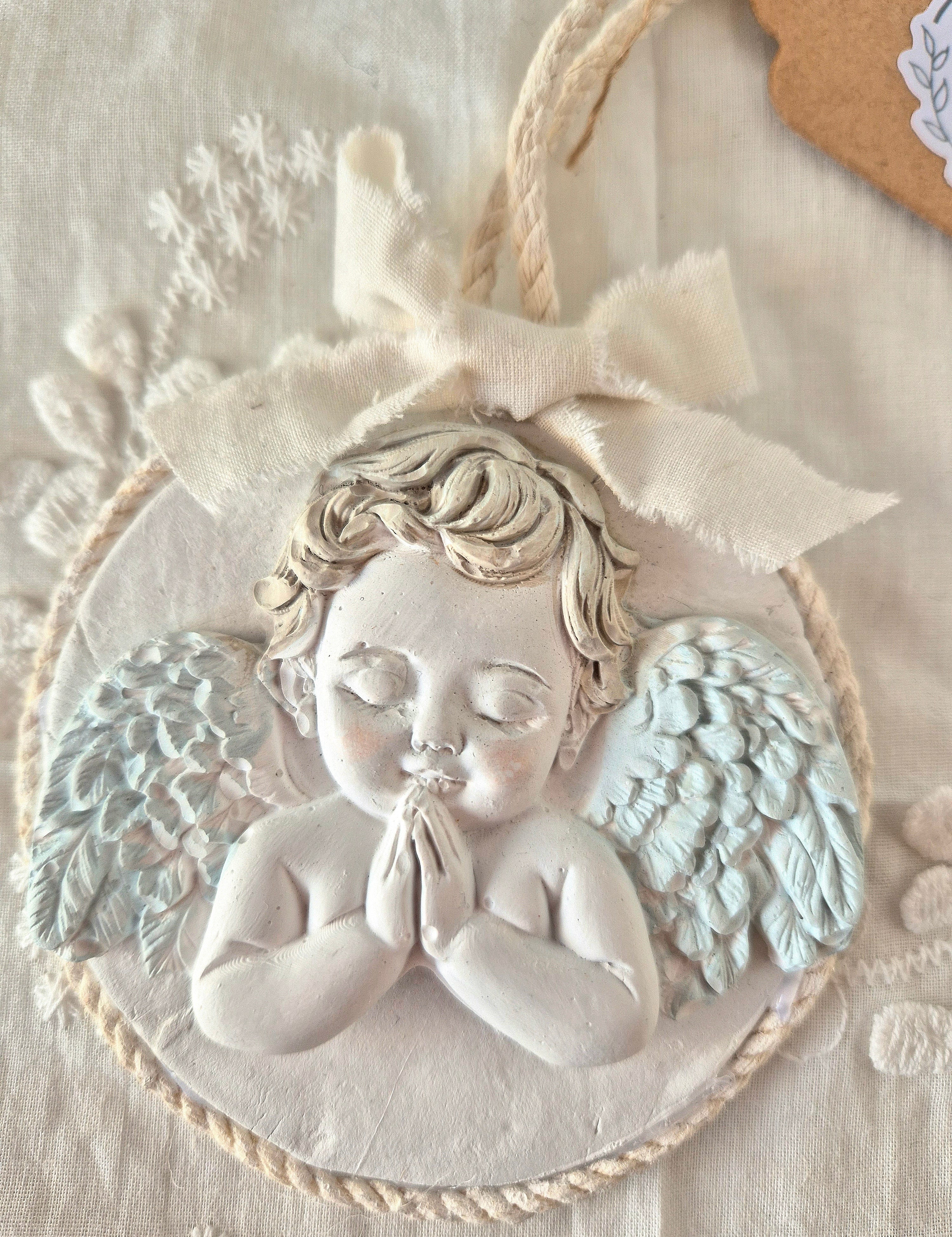 Cunero_angel_torso_cerca.jpg