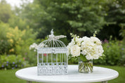 Jaula decorativa de metal estilo vintage romántico con detalles de flores de cerámica blancas ideal para decoración de interiores, terraza o jardines  con aire provenzal. Lily Garden & deco